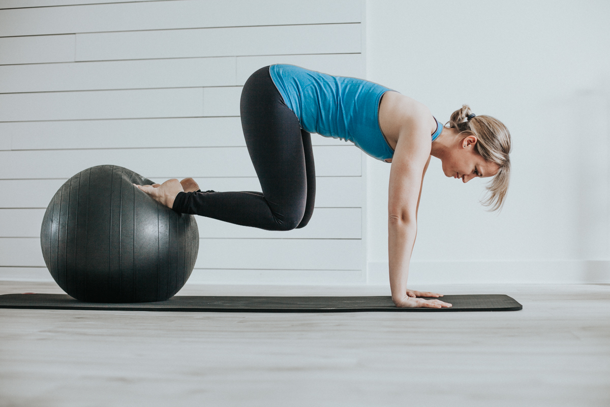 Reverse abs on the stability ball - Complete Pilates