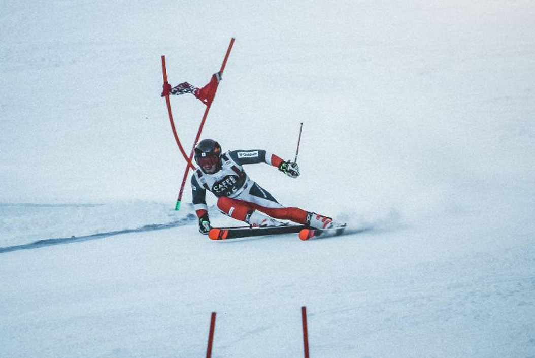 Skiers - A photo of a downhill skier mid turn on the slopes
