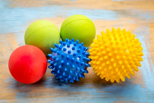Pilates exercise balls - self massage and reflexology therapy concept - a set of small rubber balls