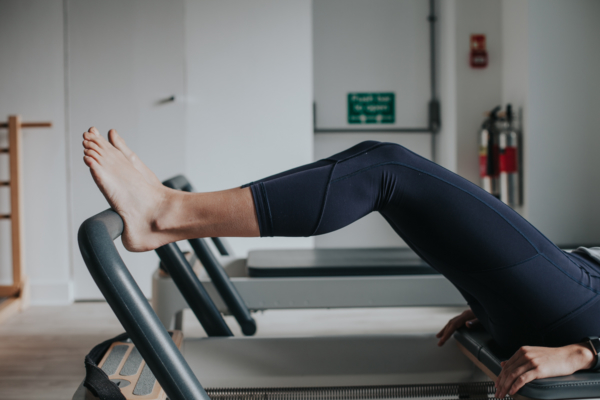 Pilates Footwork exercise using the Reformer machine - Positions +