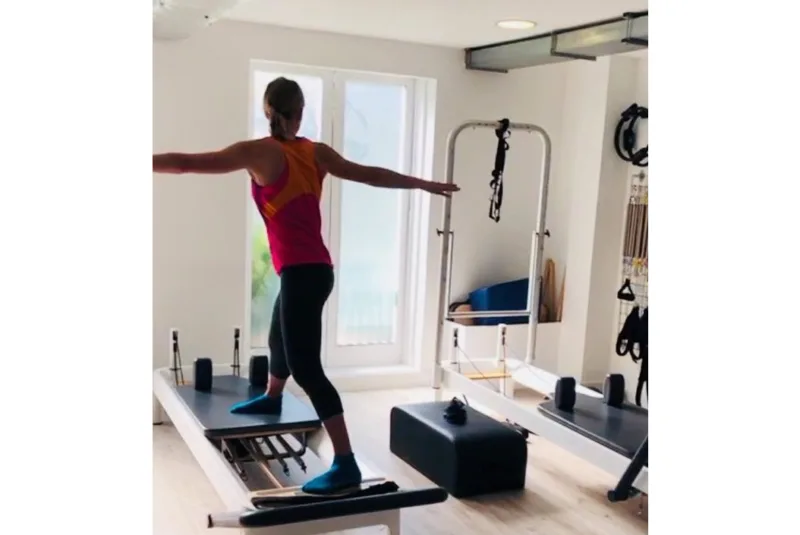 Pilates for Squash Players - Alison Waters performing Pilates exercises in a studio