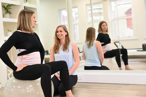  Pregnant lady doing Pilates