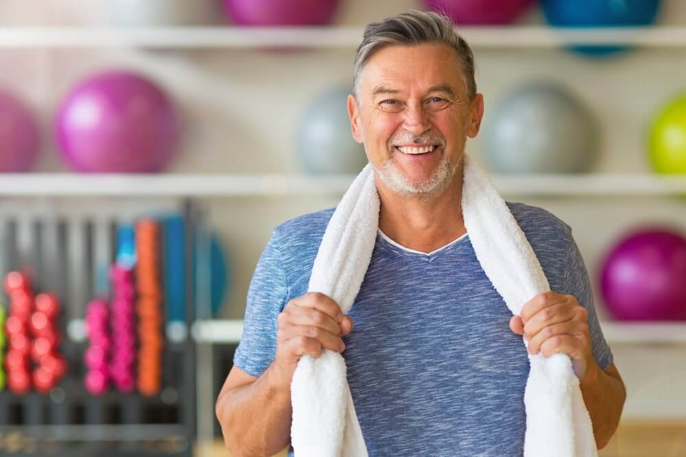 Smiling man in the gym