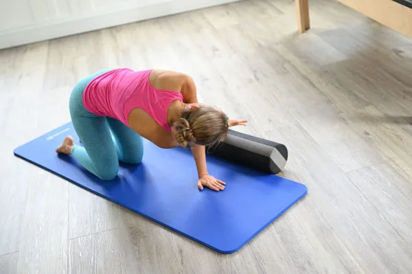 Foam roller thread the needle | Complete Pilates