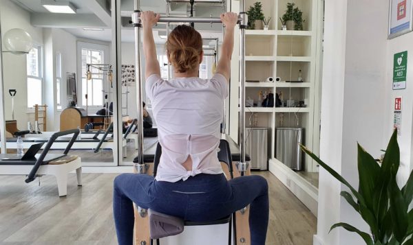 Hang from a bar with scoliosis| Complete Pilates