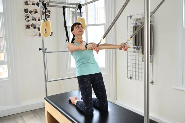 eccentric quads trapeze table Complete Pilates