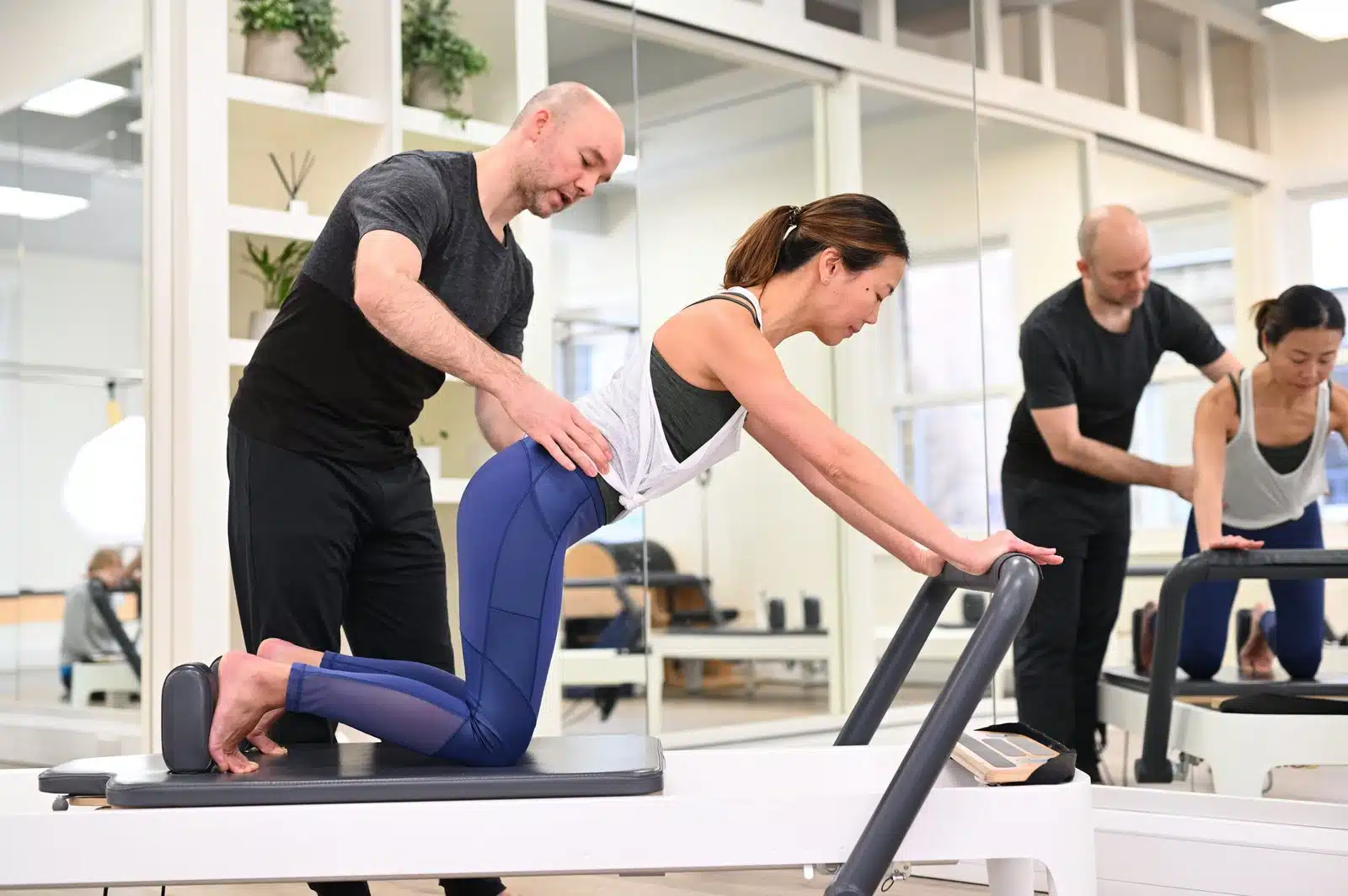 Group Reformer Pilates class in London